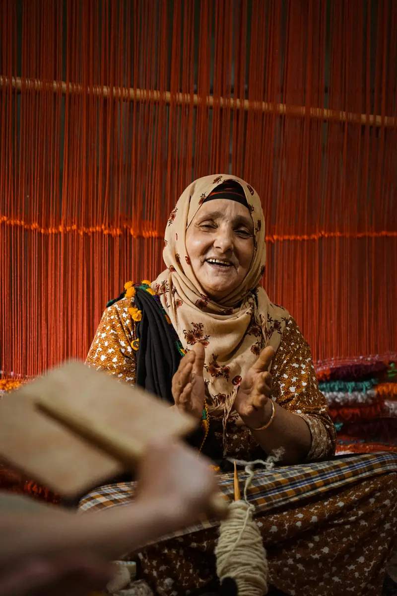 Handwoven Kashmiri shawl draped over the shoulder